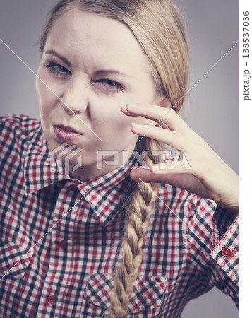 Disgusted young teen woman 138537036