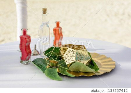 Decorative sand ceremony bottles with gold accents 138537412