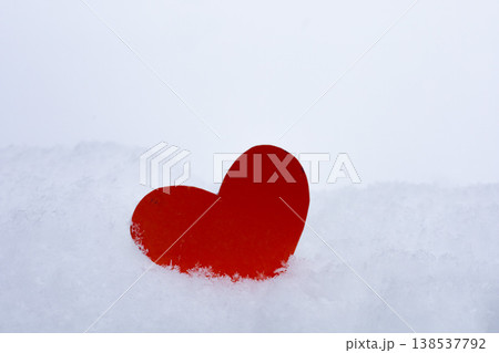 Valentine's day greeting card, heart in white snow. 138537792