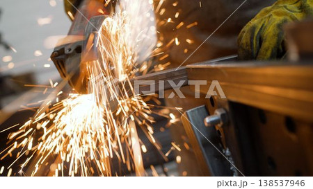 Angle Grinder Cutting Metal with Sparks Angle Grinder Cutting Metal with Sparks 138537946
