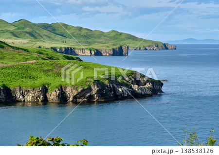 The nature of the Khasansky district of Primorsky Krai, Russia. The lip of the Teal of the Slavic Bay, the inner bay of Peter the Great in the summer. 138538126