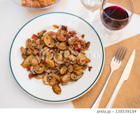 Served sauteed champignons Served sauteed champignons 138539184