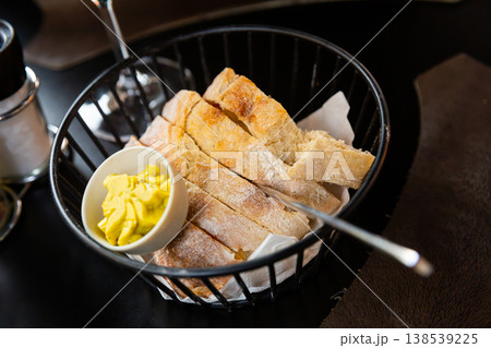 Slices of bread with butter Slices of bread with butter 138539225