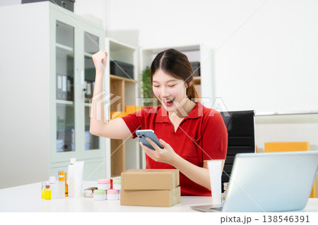 Startup small business SME, Entrepreneur owner woman using smartphone or tablet taking receive and checking online purchase shopping order Startup small business SME, Entrepreneur owner woman using smartphone or tablet taking receive and checking online purchase shopping order 138546391