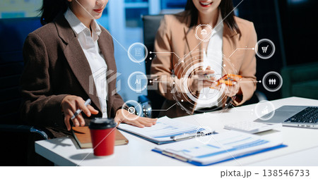 Asian Team business meeting presentation. Hand businesswoman working project in modern office.Laptop computer and tablet and smart phone Asian Team business meeting presentation. Hand businesswoman working project in modern office.Laptop computer and tablet and smart phone 138546733