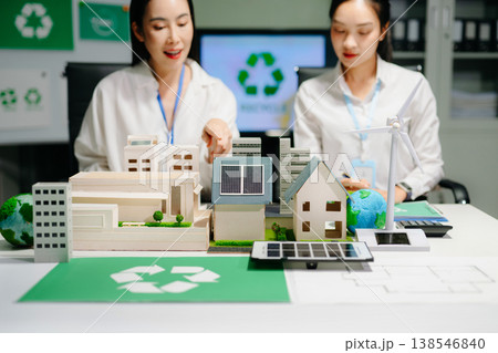 Business team people planning hand using laptop for working technology and business Net zero and carbon neutral concept.NET ZERO icons and symbols save the eco world. green energy 138546840