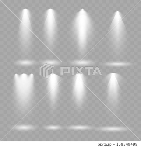 Realistic White Spotlight Beams Set. Vector Stage Illumination and Glowing Light Rays on Transparent Background. Realistic White Spotlight Beams Set. Vector Stage Illumination and Glowing Light Rays on Transparent Background. 138549499