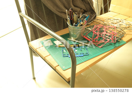 Model Kit Parts on Bench Model Kit Parts on Bench 138550278
