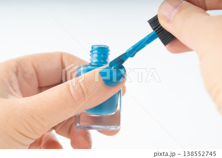Applying nail polish in close-up. Getting manicures on your own at home Applying nail polish in close-up. Getting manicures on your own at home 138552745