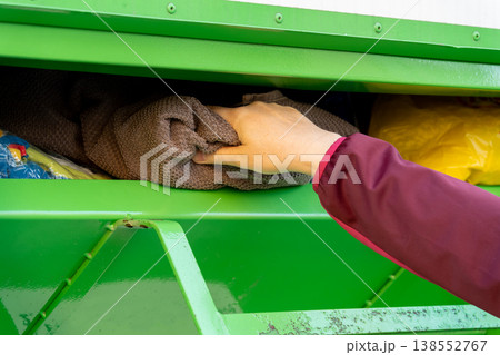 Clothes donation bin, recycling clothing box for old textile 138552767