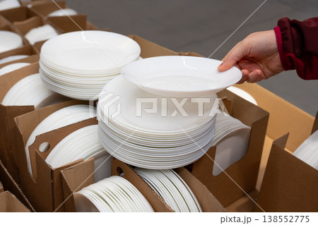 Boxes of white plates in crockery shop, dishware, tableware stack in store Boxes of white plates in crockery shop, dishware, tableware stack in store 138552775