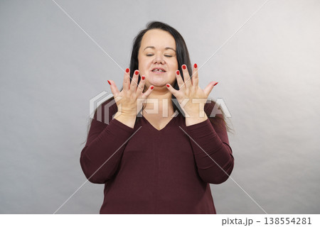 Shocked terrified adult woman 138554281