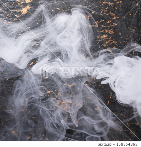 Abstract white smoke on dark concrete background Abstract white smoke on dark concrete background 138554865
