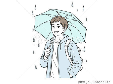 雨の中で微笑む青年 138555237