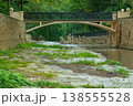 Pedestrian bridge and balancing stones on Olkhovka river in Kislovodsk National Park, Resort town Kislovodsk, Stavropol Territory, Russia 138555528