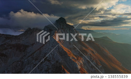 Aerial view of amazing rocky mountains at sunset 138555839