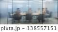 Photo of a blurred meeting room behind frosted glass, business meeting in progress, office interior, corporate environment, teamwork and collaboration concept 138557151