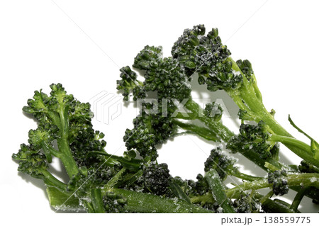 Close up of purple sprouted broccoli blanched on white background Close up of purple sprouted broccoli blanched on white background 138559775