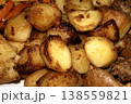 Close up of roasted vegetables crsipy potatoes side dish for Sunday roast dinner 138559821