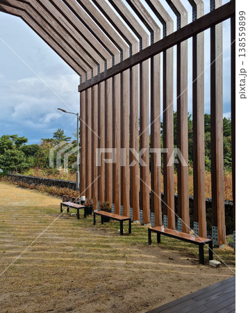 This is an outdoor park with benches. This is an outdoor park with benches. 138559899