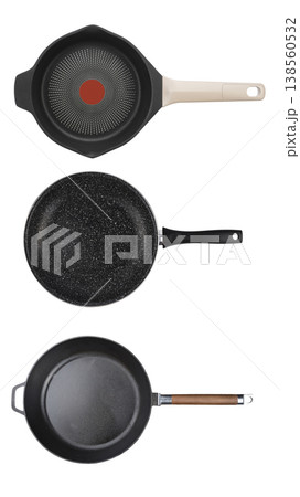 Set of three professional non-stick frying pans isolated on white background 138560532