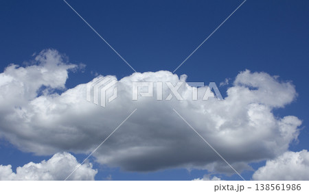 Blue sky with puffy clouds 138561986