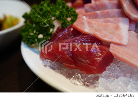 Close up of fresh red tuna akami and marbled otoro sashimi on ice Close up of fresh red tuna akami and marbled otoro sashimi on ice 138564165
