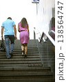 Couple walking up stairs at the underground pedestrian crossing in the city 138564747