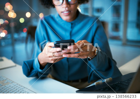 Night, phone and hands of business woman in office with social media, text or chat communication. Working late, message and female entrepreneur with smartphone app for internet, search or reading 138566233
