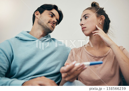 Couple, pregnancy test and stress in home for infertility, anxiety or support. Woman, or male person or frustrated ovulation news or waiting information fear for loss, relationship problem or comfort Couple, pregnancy test and stress in home for infertility, anxiety or support. Woman, or male person or frustrated ovulation news or waiting information fear for loss, relationship problem or comfort 138566239