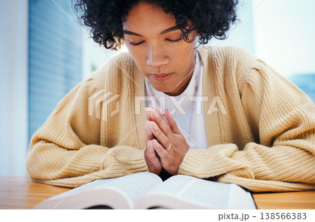 Bible, prayer and woman in home for religion, Christian worship and reading to study. Person, holy book and meditation at desk for God, Jesus Christ and faith in spiritual gospel, praise and hope Bible, prayer and woman in home for religion, Christian worship and reading to study. Person, holy book and meditation at desk for God, Jesus Christ and faith in spiritual gospel, praise and hope 138566383