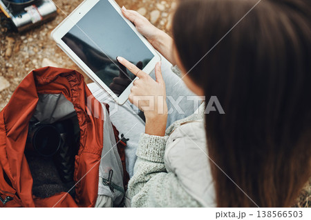Woman, hands and tablet screen on camp for social media, navigation or outdoor communication in nature. Closeup of female person with technology display, app or mockup for networking or online search 138566503