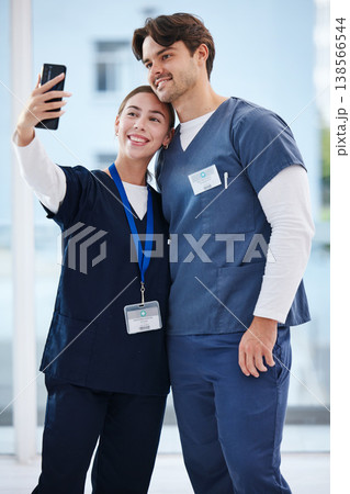 Happiness, people and selfie of team doctors, nurses or surgeon smile, profile picture and hospital photography. Clinic partner, medical teamwork and medicine expert post friends to social media app Happiness, people and selfie of team doctors, nurses or surgeon smile, profile picture and hospital photography. Clinic partner, medical teamwork and medicine expert post friends to social media app 138566544
