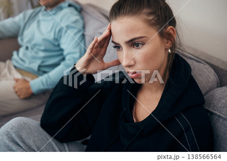 Divorce, stress and angry couple on a sofa after fighting, argue or infertility problem at home. Marriage, conflict and frustrated woman in living room overthinking, anxiety or sad with cheating man Divorce, stress and angry couple on a sofa after fighting, argue or infertility problem at home. Marriage, conflict and frustrated woman in living room overthinking, anxiety or sad with cheating man 138566564