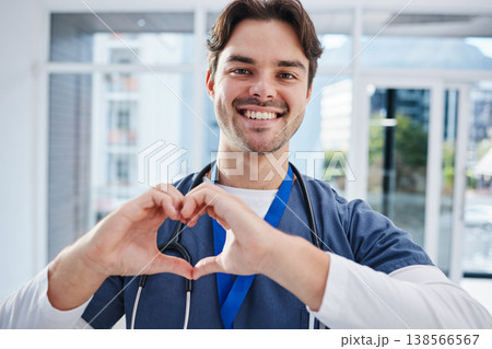 Heart in hands, hospital and portrait of doctor for support, charity and working in clinic for wellness. Healthcare, emoji and happy man with gesture for medical service, consulting and insurance Heart in hands, hospital and portrait of doctor for support, charity and working in clinic for wellness. Healthcare, emoji and happy man with gesture for medical service, consulting and insurance 138566567