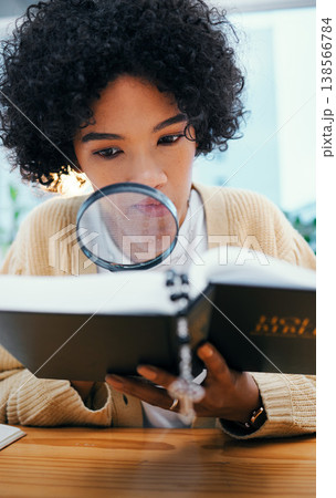 Bible, magnifying glass and woman search with investigation, religion research and Christian study. Book, learning and information in home with cross, story analysis and lens for spiritual knowledge 138566784