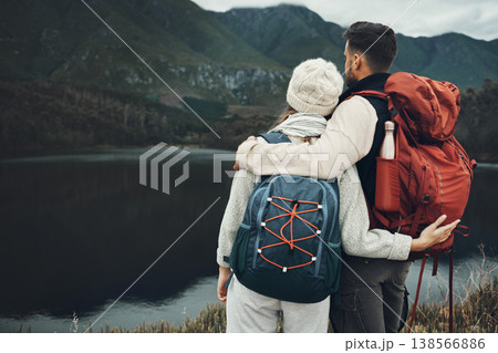 Couple, back with hiking and nature view with travel, mountain and backpacking with wilderness and explore outdoor. People on adventure, holiday with anniversary date and environment with trekking Couple, back with hiking and nature view with travel, mountain and backpacking with wilderness and explore outdoor. People on adventure, holiday with anniversary date and environment with trekking 138566886