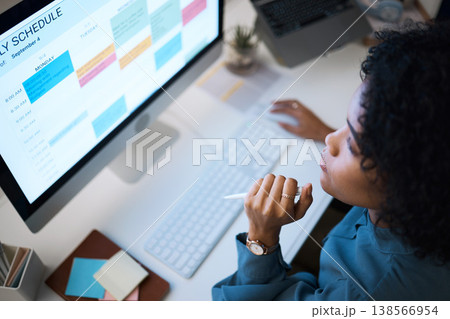 Woman with computer, thinking and checking schedule, agenda and reminder for office administration. Online calendar, planner and girl at desk planning spreadsheet for time management with high angle. Woman with computer, thinking and checking schedule, agenda and reminder for office administration. Online calendar, planner and girl at desk planning spreadsheet for time management with high angle. 138566954