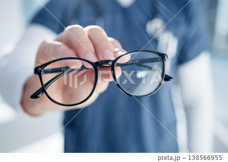 Optometry, glasses and hands of person with frames, prescription lens and spectacles for sight. Healthcare, ophthalmology and optician in clinic for eye care, vision and medical service for wellness 138566955