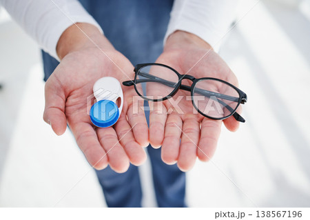 Optometrist, contact lens and glasses for sight, vision or prescription for choice, laser or optician. Doctor, medicine or professional with frames, medical and health for optometry, close up or case 138567196