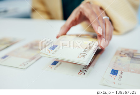 Hands, accounting and a business person counting money closeup in the office of a bank for finance. Cash, budget and economy with a financial manager closeup in the workplace for investment growth Hands, accounting and a business person counting money closeup in the office of a bank for finance. Cash, budget and economy with a financial manager closeup in the workplace for investment growth 138567325