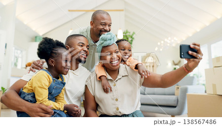 Moving, happy family and selfie with kids in new home, boxes and people in living room of house. African mother, father and children in self portrait with boxes, real estate and happy investment. Moving, happy family and selfie with kids in new home, boxes and people in living room of house. African mother, father and children in self portrait with boxes, real estate and happy investment. 138567486