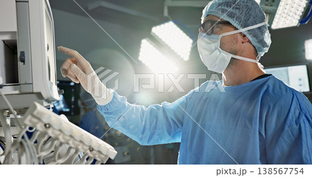 Team, surgeon and press monitor in hospital, clinic and operation theater. ECG, doctor and medical professional on tech for heart rate monitor, cardiology and man on electrocardiogram on lens flare Team, surgeon and press monitor in hospital, clinic and operation theater. ECG, doctor and medical professional on tech for heart rate monitor, cardiology and man on electrocardiogram on lens flare 138567754