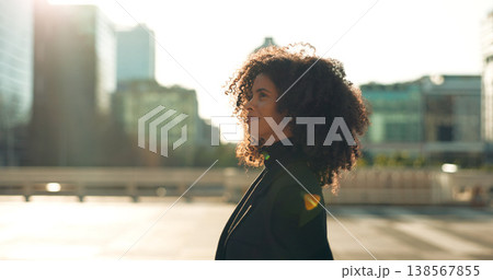 Business, black woman and walking outdoor in city building with thinking and smile for morning travel or journey outdoor. Happy, person with afro and corporate worker moving to work in urban town Business, black woman and walking outdoor in city building with thinking and smile for morning travel or journey outdoor. Happy, person with afro and corporate worker moving to work in urban town 138567855
