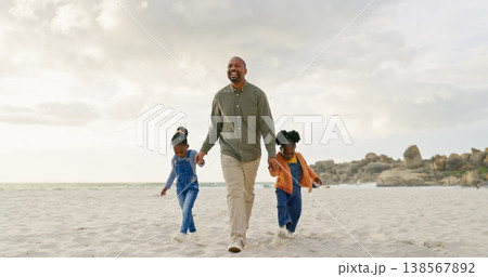 Walking, father and children holding hands at the beach for bonding, summer freedom and care. Happy, family and an African dad with affection for kids on a walk in the sand at the ocean on holiday 138567892