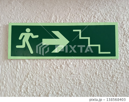 Emergency exit ladder with arrow  138568403