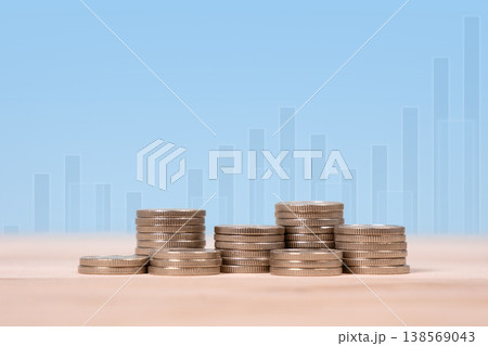 Stacked coins as symbol of success, money saving deposit, investment dividend growth concept, increase product sales growth, goals achievement and business success, task completion. Stacked coins as symbol of success, money saving deposit, investment dividend growth concept, increase product sales growth, goals achievement and business success, task completion. 138569043