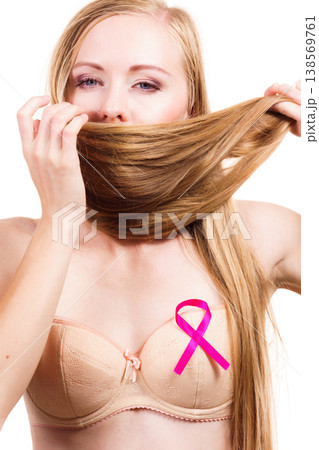 Woman chest in bra, pink cancer ribbon 138569761