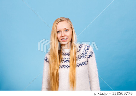 Happy woman showing her braces on teeth 138569779