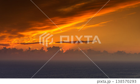 Sunset over sea surface 138570293